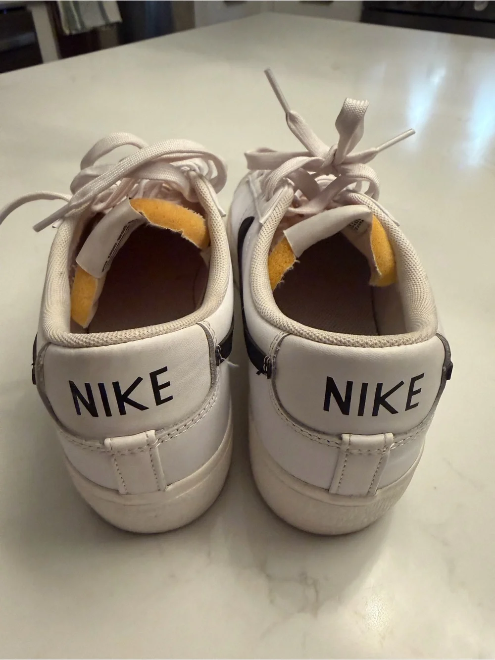 Nike Woman’s White & Black Low-Top Sneakers